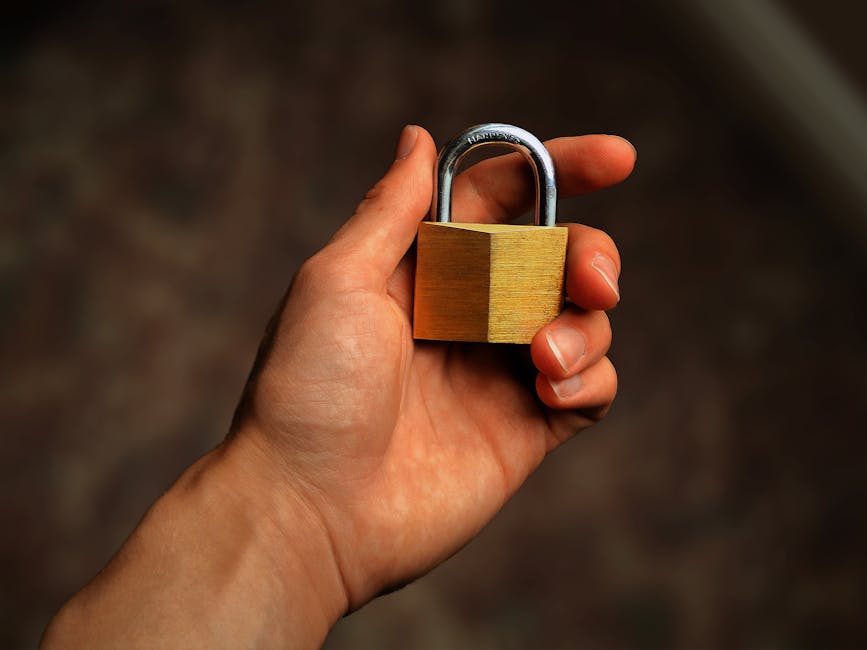 Illustration of SIM Swapping Scam — a padlock on a computer keyboard