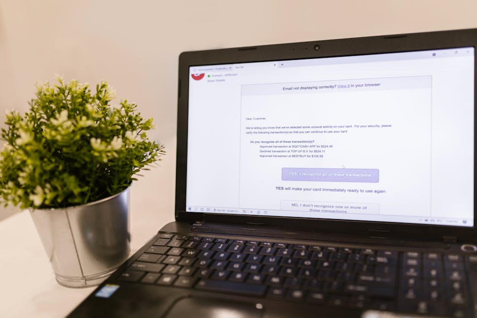 Illustration of Phishing &amp; Smishing Scams — a suspicious email open on a laptop